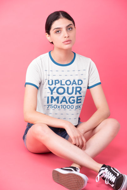 Ringer T-Shirt Mockup Featuring a Woman Sitting on the Floor of a Studio 27179