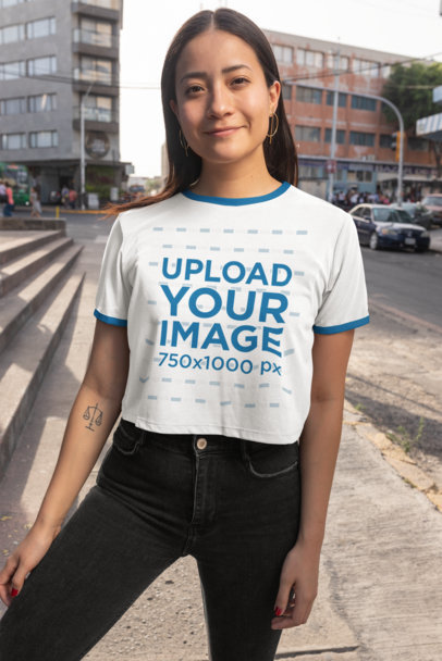 Ringer Tee Mockup Featuring a Smiling Woman in the Street