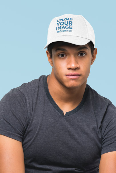 Dad Hat Mockup of a Young Man Against a Plain Background