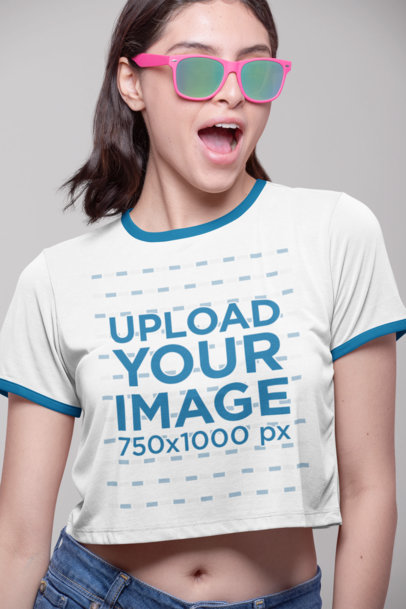 Mockup of a Funny Woman Wearing a Ringer Tee and Sunglasses 
