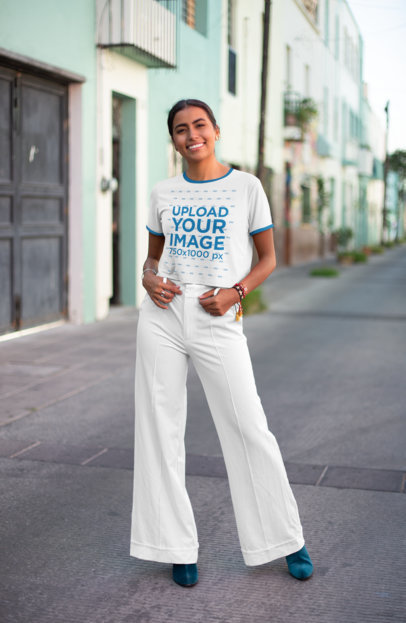 Ringer T-Shirt Mockup Featuring a Woman Posing on a Pedestrian Zone