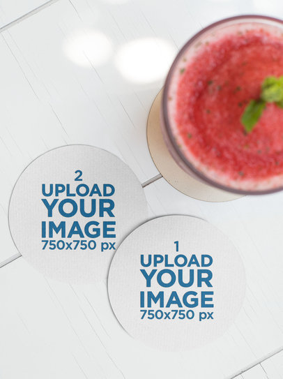 Mockup of Two Round Coasters Next to a Strawberry Daiquiri 27793