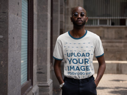 Heather Ringer Tee Mockup of a Man with Sunglasses Walking in the City 
