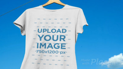 Video of a T-Shirt Hanging against a Bright Blue Sky 13137