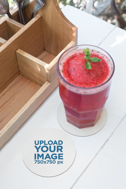 Round Coaster Mockup Featuring a Strawberry Smoothie 27797