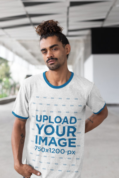 Mockup of a Man with a Man Bun Wearing a Heather Ringer Tee 