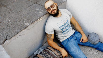 T-Shirt Video of a Man Resting in The Street