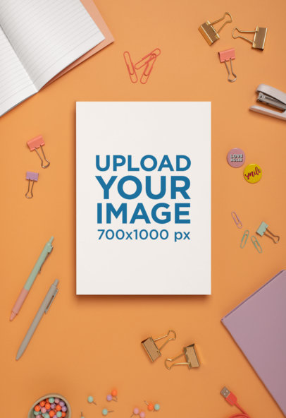 Mockup of an A4 Letterhead Surrounded by Paper Clips and Office Supplies 