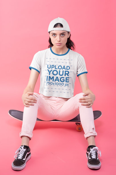 Ringer Tee Crop Top Mockup of a Woman Sitting on a Skateboard