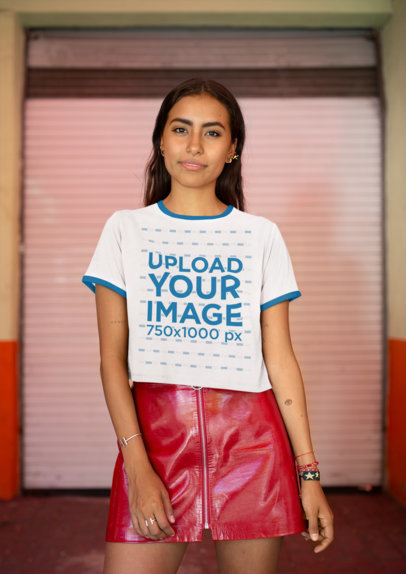 Mockup of a Fabulous Woman Wearing a Ringer T-Shirt and a Red Leather Skirt