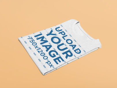 Mockup of a Folded Heather T-Shirt in a Minimalistic Setting 