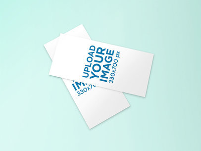 Mockup of Two Overlapped DL Flyers Against a Minimalist Background