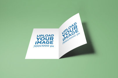 Mockup of an A5 Bifold Brochure on a Plain Color Surface 29-el