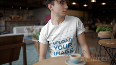 T-Shirt Video Featuring a Young Man Drinking Coffee 22457