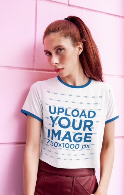 Mockup of a Red-Haired Young Woman Wearing a Ringer T-Shirt