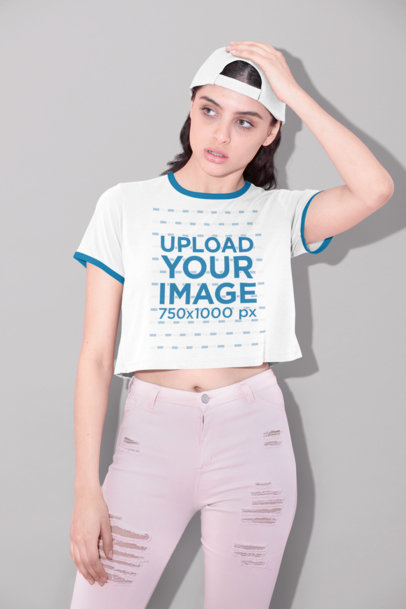 Ringer T-Shirt Mockup Featuring a Woman Touching Her Head