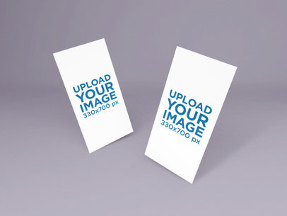 Mockup of Two DL Flyers Floating in a Minimalist Surface