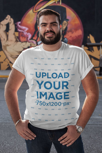 Plus Size T-Shirt Mockup Featuring a Bearded Man Against a Graffiti Wall