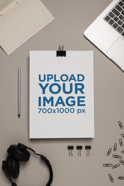 Mockup of an A4 Letterhead Next To Some Electronic Devices