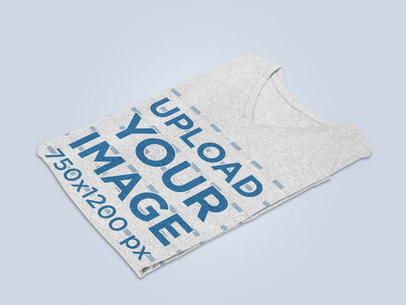 Mockup of a Folded Heathered V-Neck T-Shirt on a Plain Surface