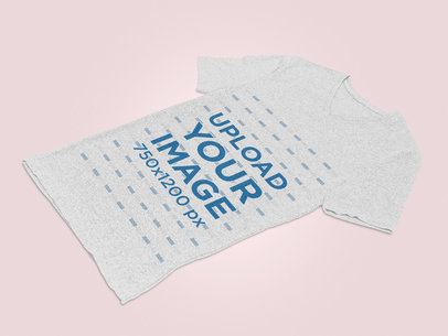 Mockup of a V-Neck Heathered Tee Lying Flat on a Plain Color Surface