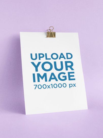 Mockup of an A4 Letterhead with a Binder Clip Against a Plain Background