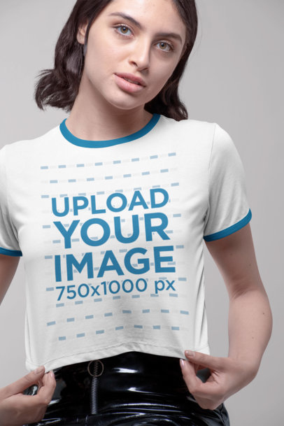Mockup of a Woman Wearing a Cropped Ringer T-Shirt