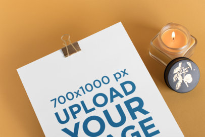 Mockup of an A4 Letterhead with a Binder Clip Next to a Candle