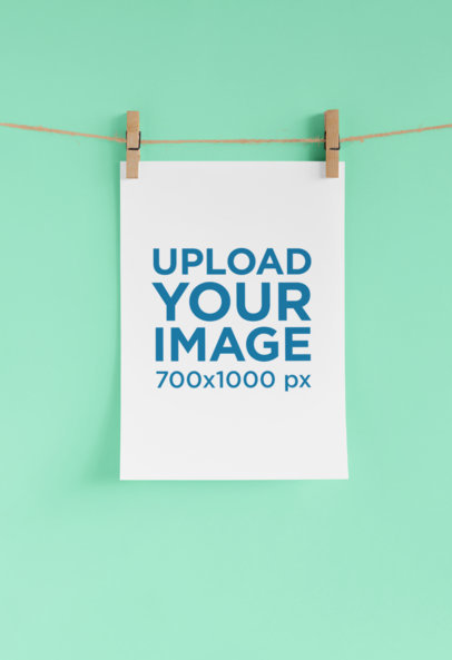 Mockup of an A4 Letterhead Hung on Two Clothespins 27227