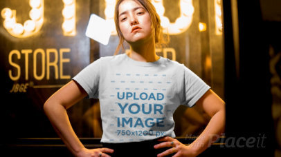 T-Shirt Multiclip Video of a Woman on a Set with Lightbulbs and Chains 