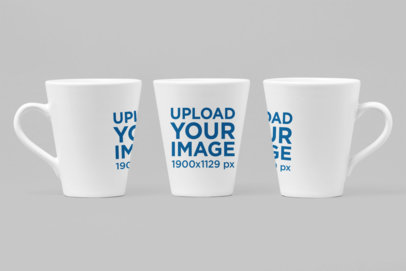 Mockup of Three 11 oz Mugs In Different Angles Against a Solid Surface