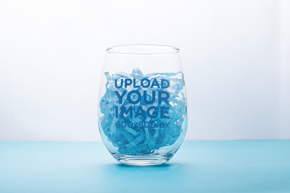 Mockup of a Stemless Wine Glass Filled with Colored Shredded Paper 27934