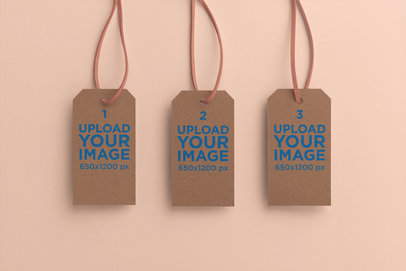 Mockup of Three Hanging Brand Tags with a Plain Background