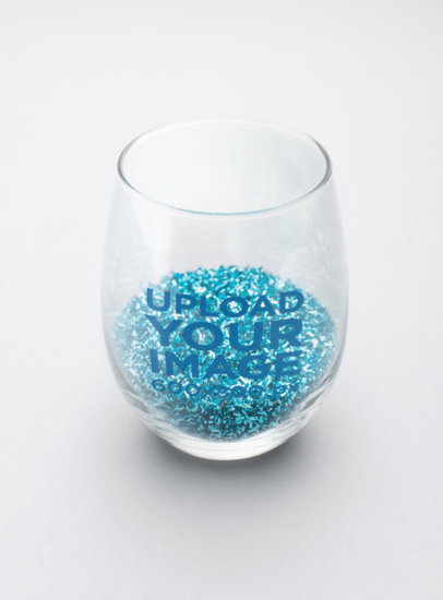 Mockup of a Stemless Wine Glass with Blue Glitter Inside 27935