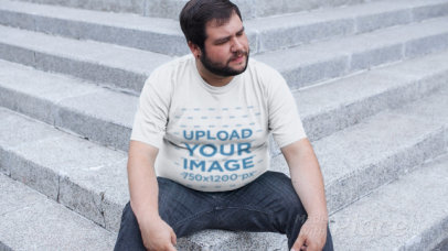Plus Size T-Shirt Video of a Man Sitting on the Stairs 