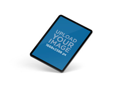 Simple iPad Pro Mockup in Portrait Position over a Flat Surface