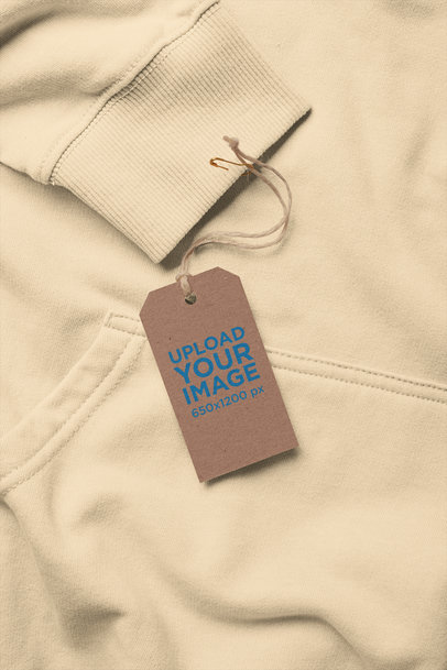 Brand Tag Mockup Attached to a Hoodie Sleeve