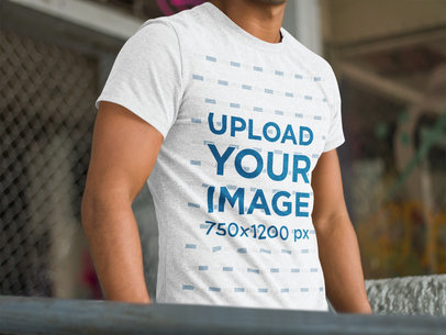 Heathered T-Shirt Mockup of a Young Man at a Skate Park 