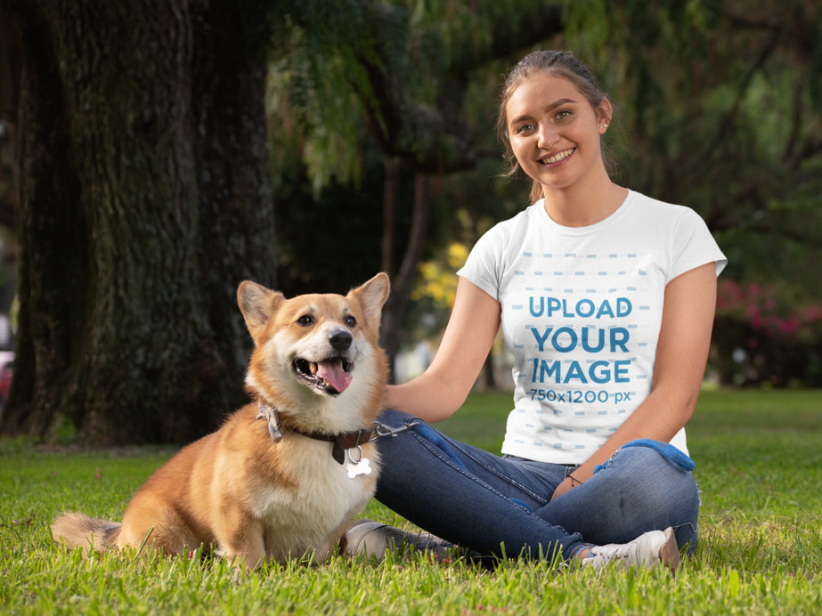 T-Shirt Mockup of a Woman with Her Corgi at a Park