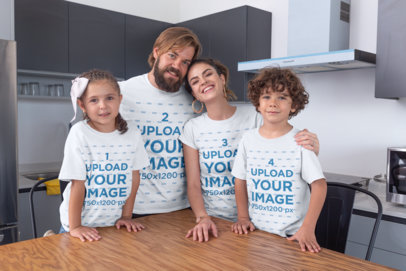 Mockup of a Family of Four Wearing T-Shirts at the Dining Room