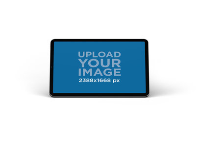 Mockup of a Laid-Back iPad Pro in Landscape Position in a Plain Setting