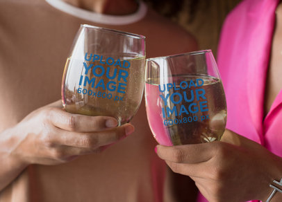 Mockup of Two Stemless Wine Glasses Clinking 27949