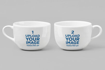 Mockup of Two 24 oz Mugs Standing Side by Side