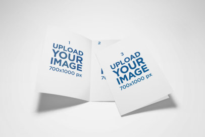 Mockup of Two A5 Bi-Fold Brochures on a Plain Surface 35-el