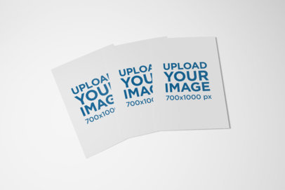 Minimal Mockup Featuring Three A5 Bi-Fold Brochures Against a Plain Background 