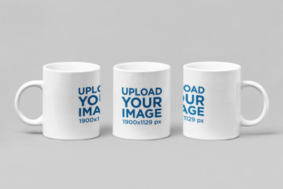 Mockup Featuring Three 11 oz Coffee Mugs Standing Side by Side