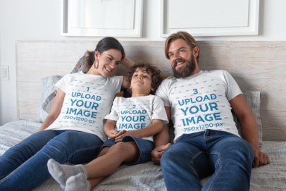T-Shirt Mockup of a Family of Three on the Bed