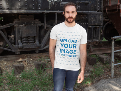 Shirt Mockup of a Man Posing in Front of a Train Wagon 28190