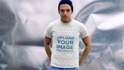 T-Shirt Video Featuring a Young Man Against a Metallic Background 