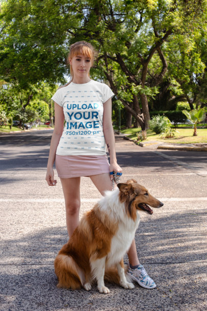 T-Shirt Mockup Featuring a Woman Taking Her Dog for a Walk